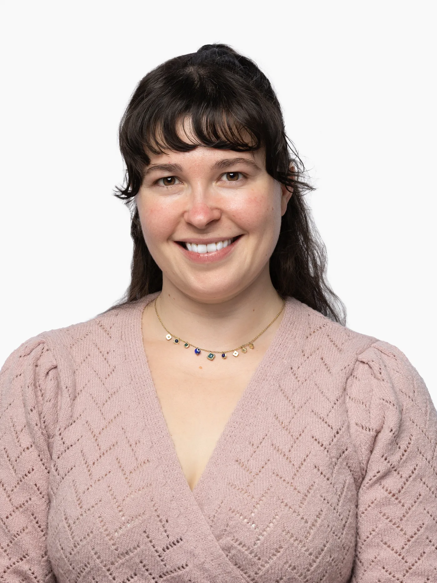 SQA Services executive portrait — advisor in soft neutral wardrobe