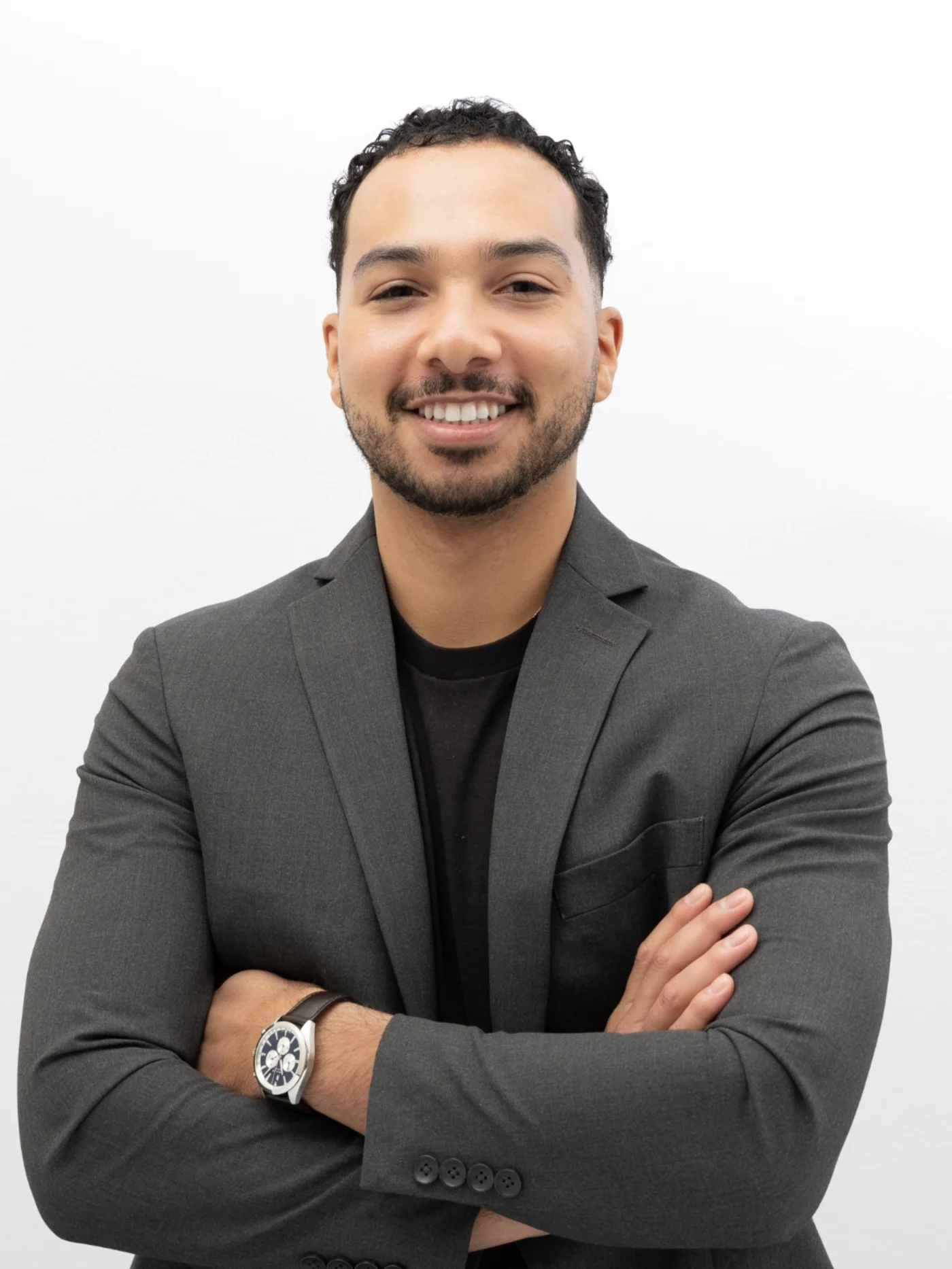 SQA Services executive portrait — leader in dark blazer with matched lighting