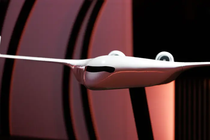 The blended-wing model in silhouette, one continuous surface from nose to wingtip