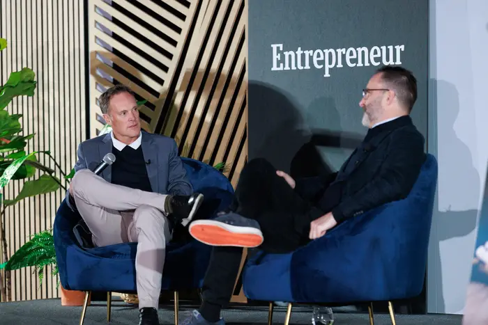 Making a point on stage during the Grit Rising conversation