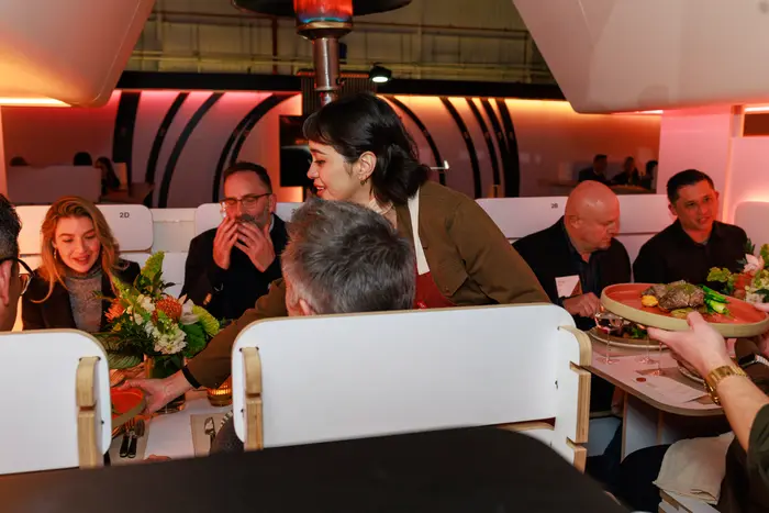 Service underway along the cabin tables