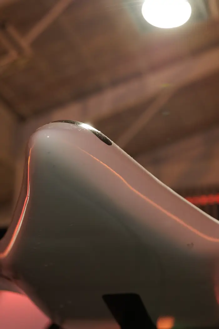 Close detail of the model's nose section and the seam along its upper surface