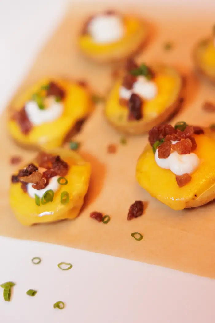 A canapé plated on white, three to a plate