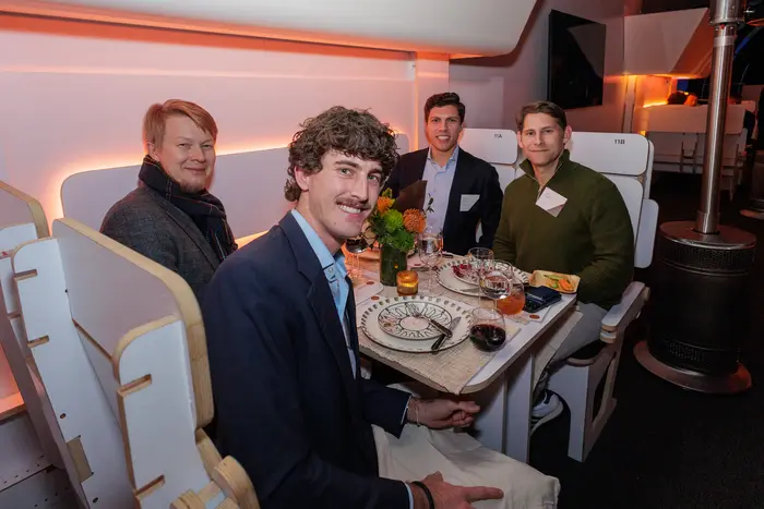 A table of guests toward the end of the meal