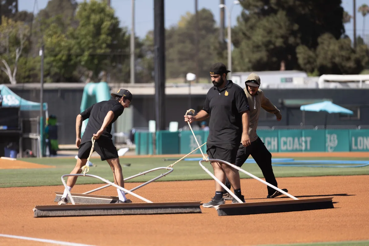 Grounds crew dragging the infield dirt before first pitch