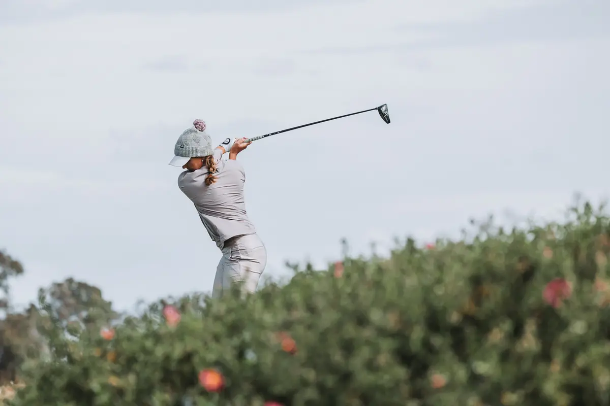 A drive struck over a bank of flowering ice plant at Palos Verdes Golf Club