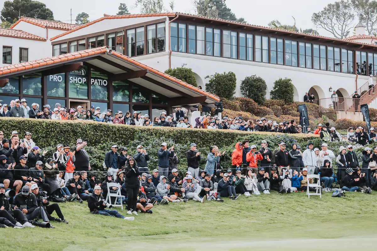The crowd banked on the hillside below the pro shop patio at Palos Verdes Golf Club