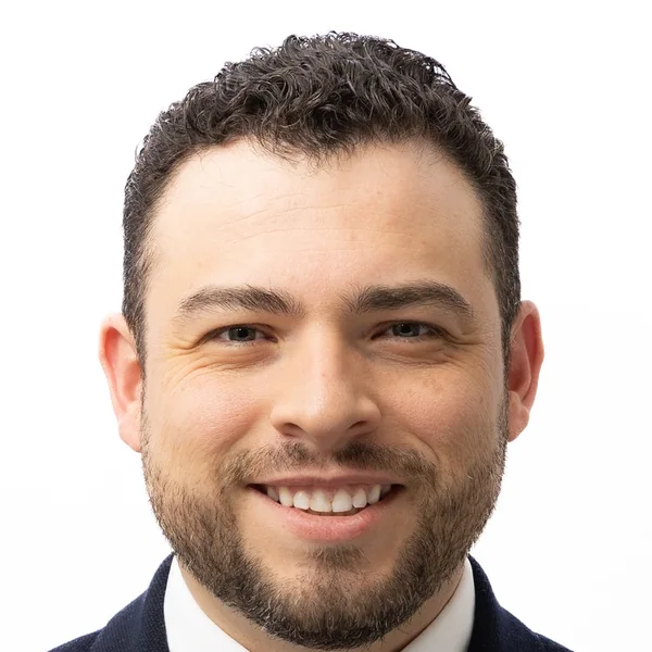 The same headshot cropped tight for a small directory thumbnail