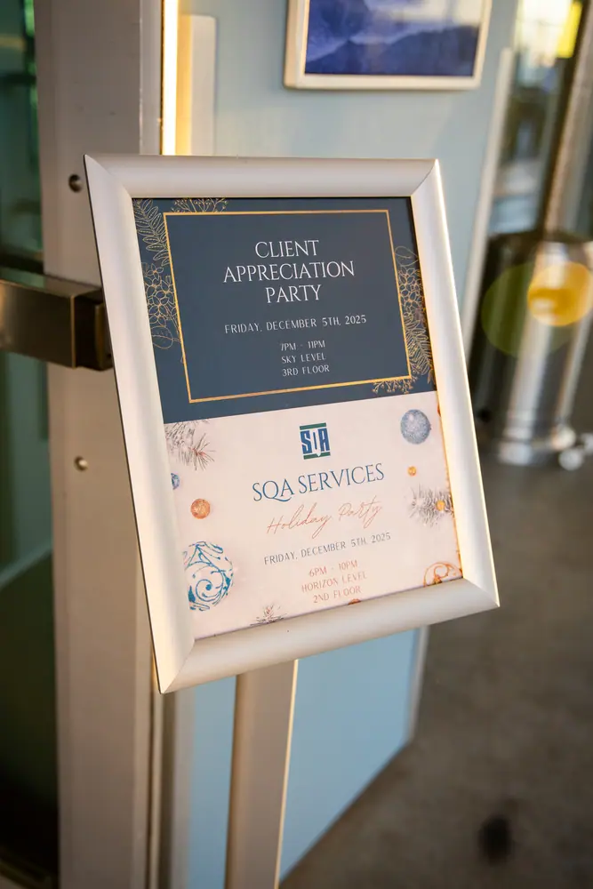 A-frame sign at Shade Hotel Redondo Beach reading Client Appreciation Party, Friday December 5th 2025, 7pm to 11pm, Sky Level, 3rd floor, with the SQA Services logo